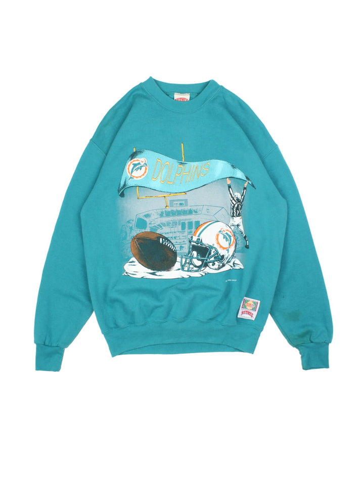 Vintage 1993 Miami Dolphins NFL Nutmeg Sweatshirt in a blue colourway with graphic print and team spell out on the front.