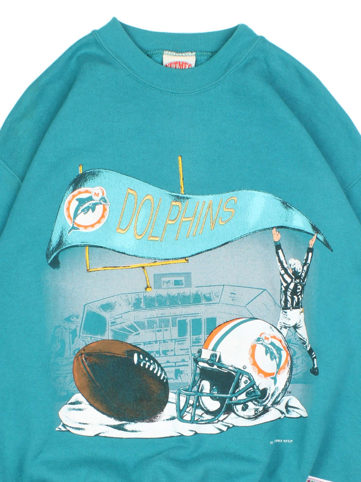 Vintage 1993 Miami Dolphins NFL Nutmeg Sweatshirt in a blue colourway with graphic print and team spell out on the front.