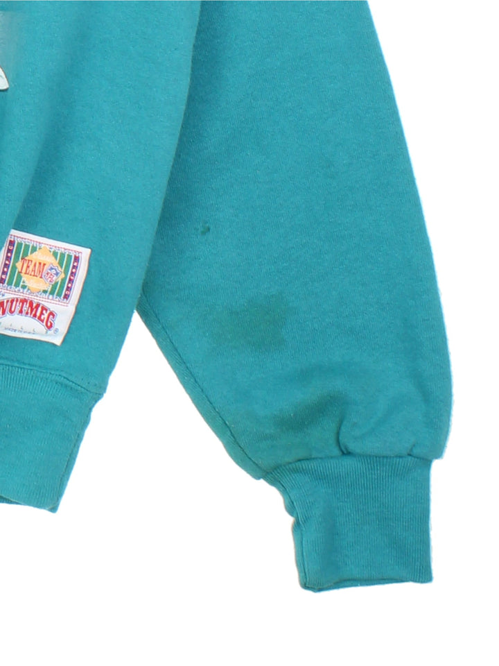 Vintage 1993 Miami Dolphins NFL Nutmeg Sweatshirt in a blue colourway with graphic print and team spell out on the front.