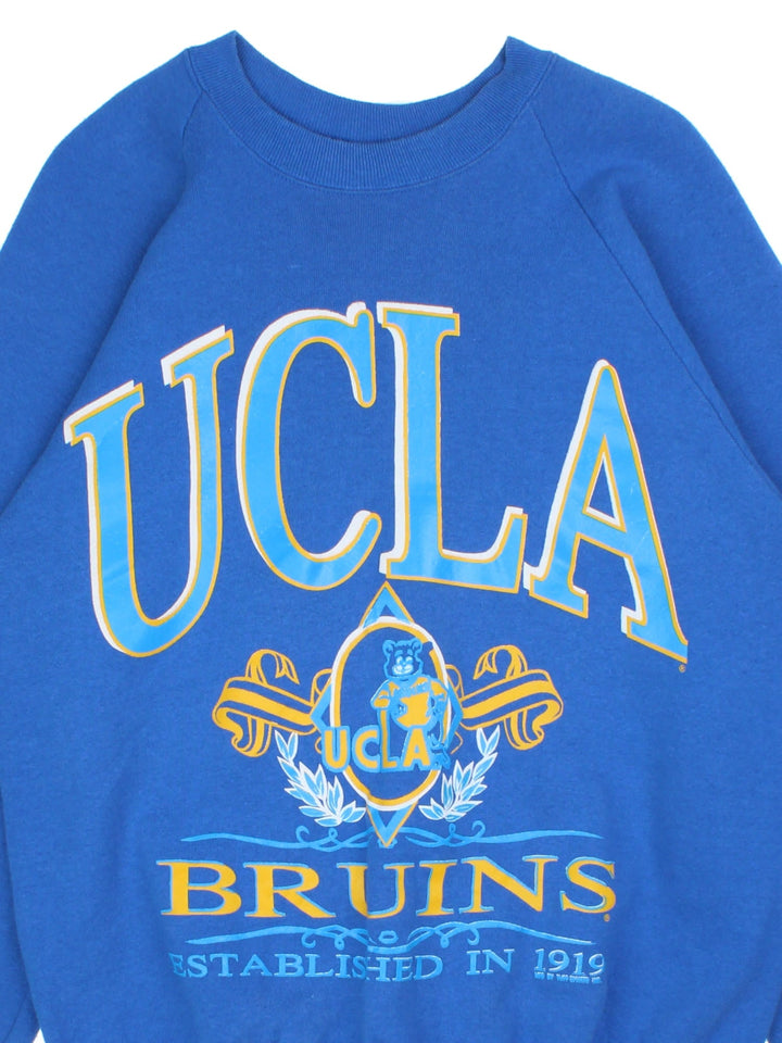 Vintage 90's UCLA Bruins Sweatshirt in a blue colourway with the logo and spell out printed on the front.