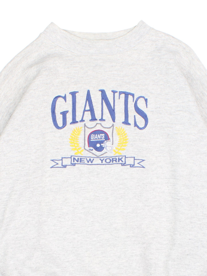 Vintage New York Giants Logo 7 NFL Sweatshirt in a grey colourway with the team logo and spell out embroidered on the front.