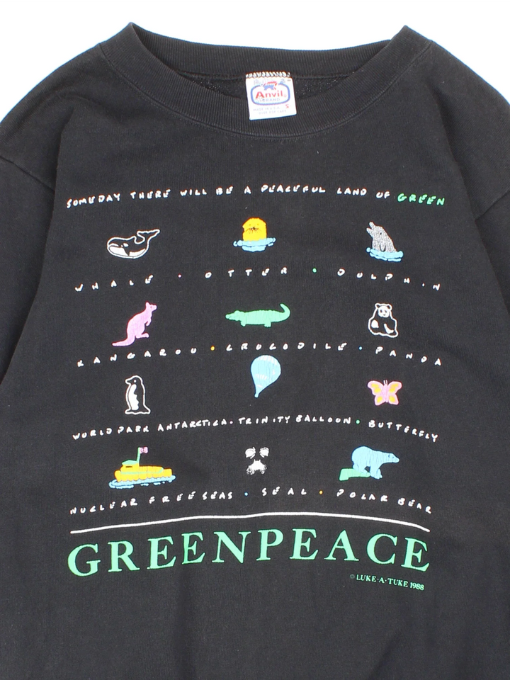 Vintage 1988 Greenpeace Graphic Sweatshirt in a black colourway with animals graphic and spell out printed on the front.