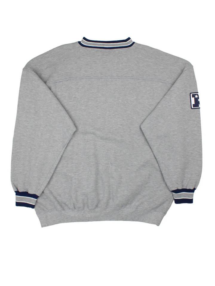 Chicago Bears NFL Sweatshirt in a grey colourway with logo and text graphic across the front and blue detailing around the collar and hem.