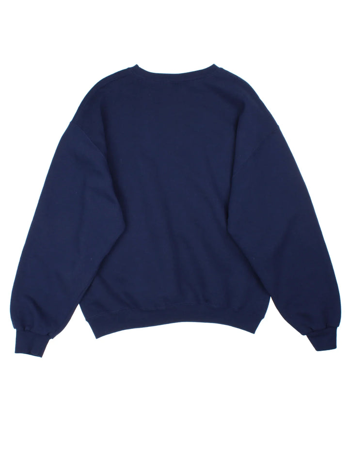Russell Athletic Pepsi Sweatshirt in a blue colourway. Crew neck and branding embroidered on the front.