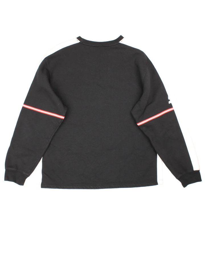 Starter Tony Stewart Nascar Racing Sweatshirt in a black/red colourway. Crew neck with contrast trims and branding embroidered on the front/sleeve.