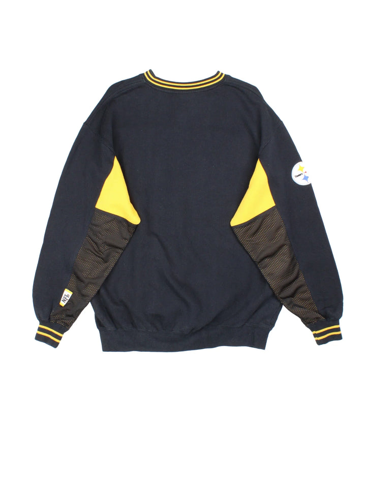 NFL Pittsburgh Steelers Sweatshirt in a black colourway with classic yellow panelling across the front and yellow detailing around the collar and sleeves. Large text logo across the front.