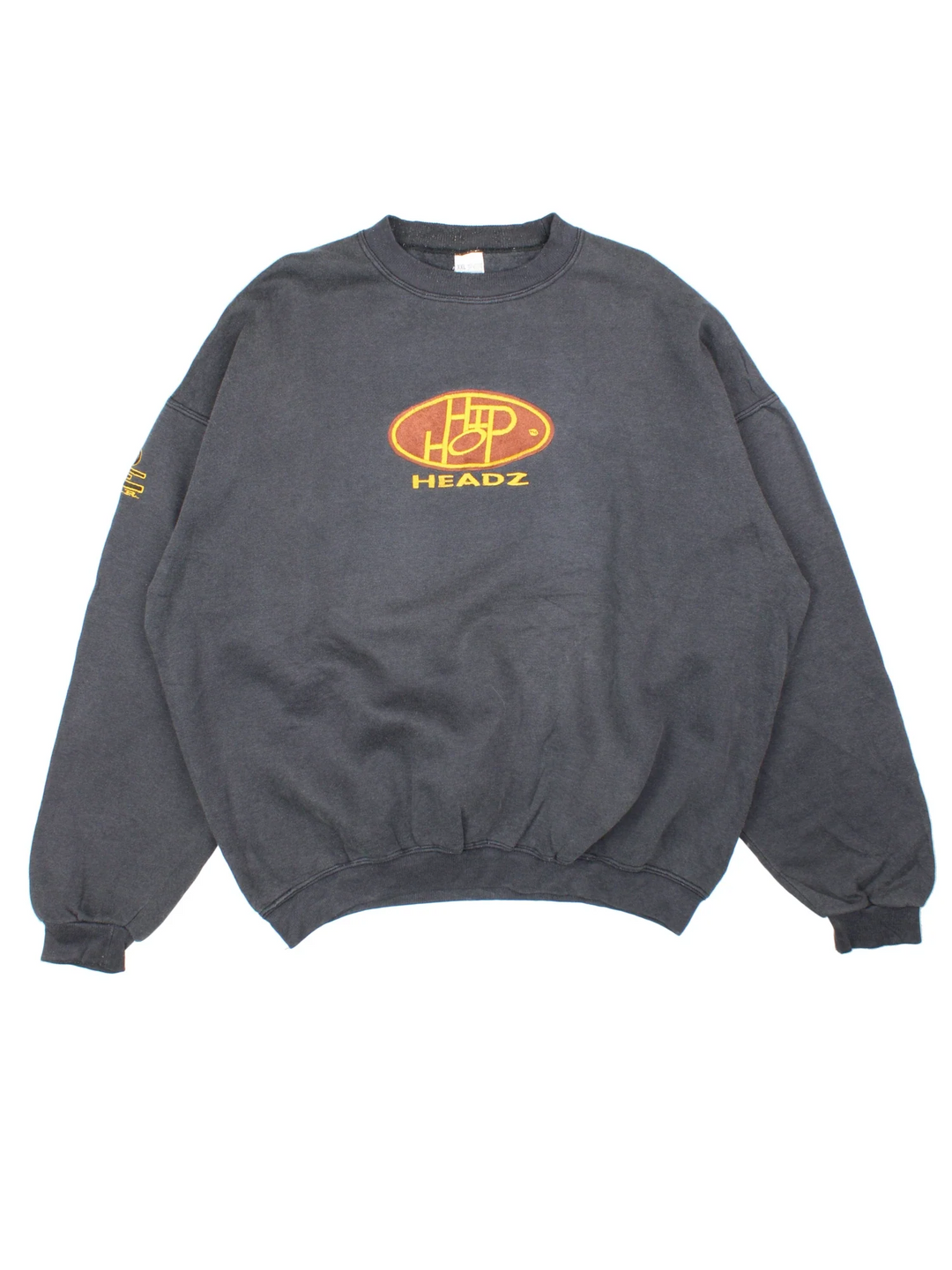 Vintage Hip Hop Headz Sweatshirt in a black colourway with the logo and graphic printed on front and sleeve.