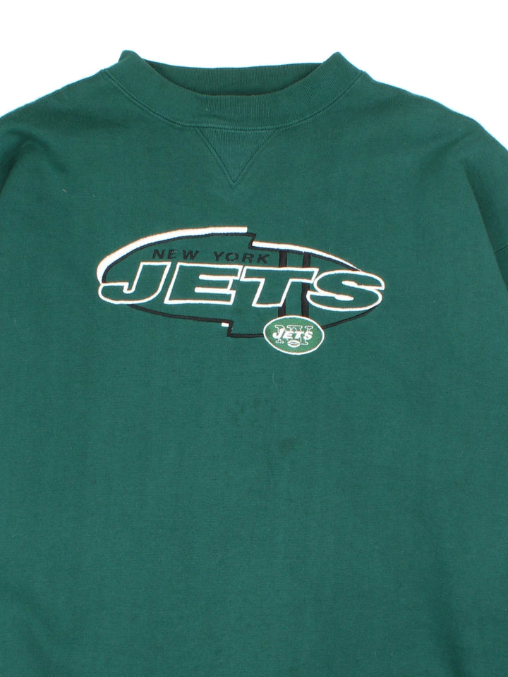 NFL New York Jets Puma Sweatshirt in a green colourway with the logo and graphic on the front.