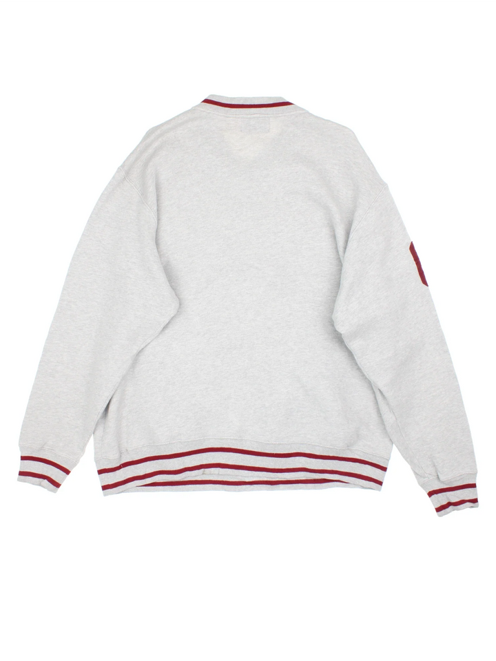 Ralph Lauren Varsity Sweatshirt in a grey colourway with red trim on the collar, hem and sleeves. Logo and number graphic on the front and sleeve.