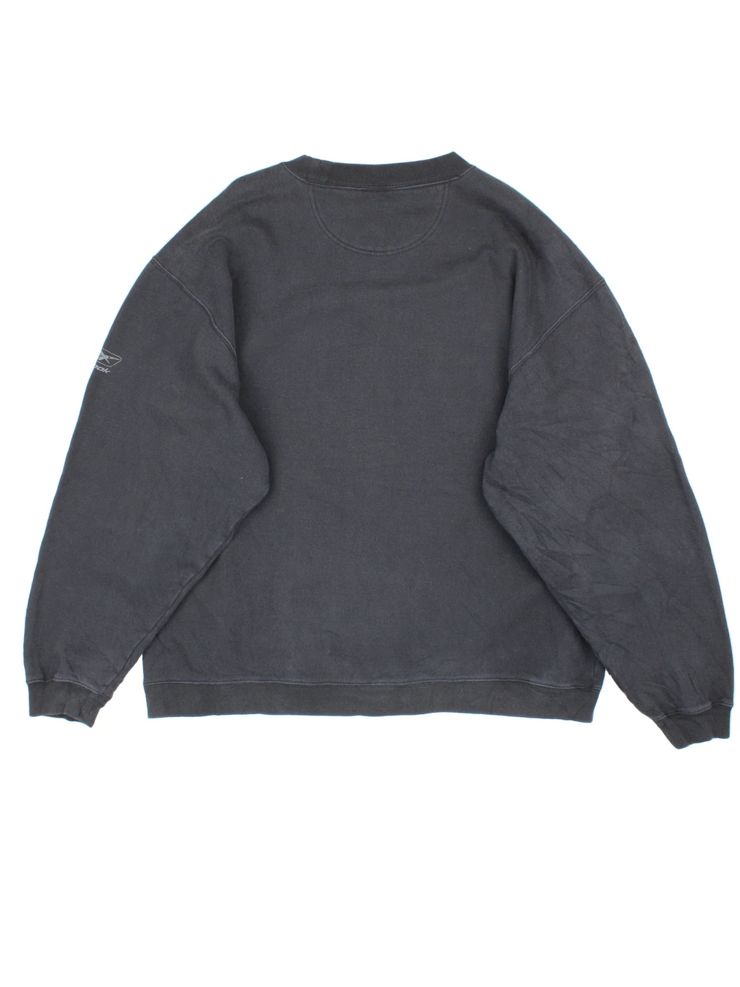Vintage Pittsburgh Steelers NFL Reebok Sweatshirt in a black colourway, with logo printed/embroidered on the front.
