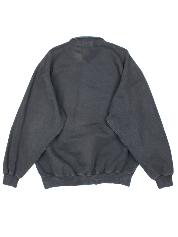 Vintage Pittsburgh Penguins NHL 1/4 Zip Sweatshirt in a black colourway, with graphic embroidered on the front.