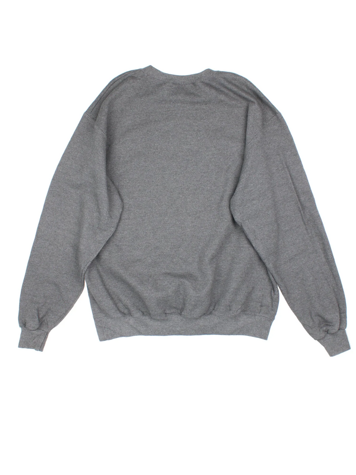 Champion Pittsburgh Sweatshirt in a grey colourway, with spell out embroidered across the front and Champion logo by the arm cuff.