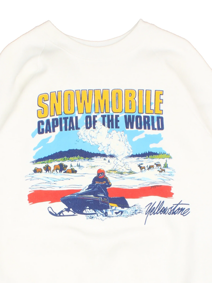 Vintage Yellowstone Snowmobile Sweatshirt in a white colourway with mountain and snowmobile graphic printed on front.