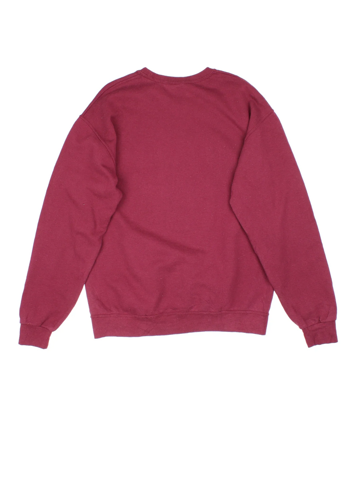 Vintage Harvard University Sweatshirt in a red colourway with the logo and graphic printed on front.