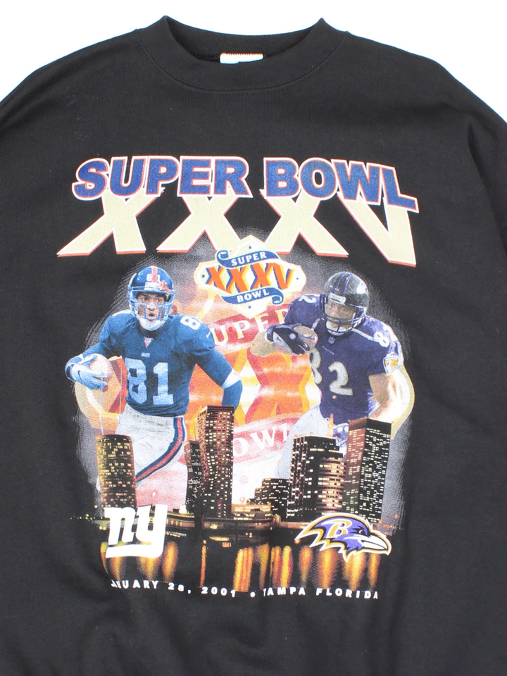 2001 NFL Superbowl Sweatshirt in a black colourway with logo and graphic printed on the front, featuring the Baltimore Ravens and the New York Giants