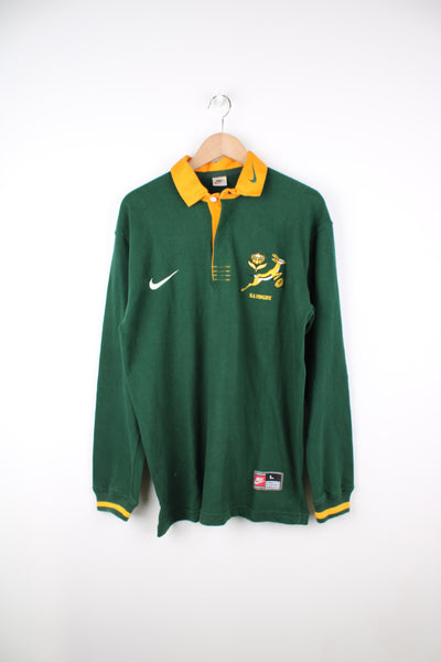 Vintage Nike x South Africa green rugby shirt with yellow collar and cuffs. Features embroidered badges on the chest