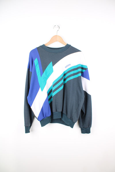 Vintage 1980's Adidas crewneck sweatshirt, features embroidered panelling and signature three stripes