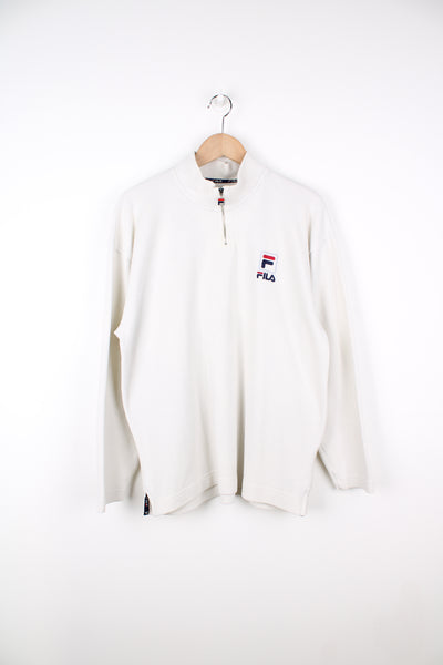 Vintage Fila waffle textured 1/4 zip sweatshirt in cream, features embroidered logo on the chest and large motif on the back 