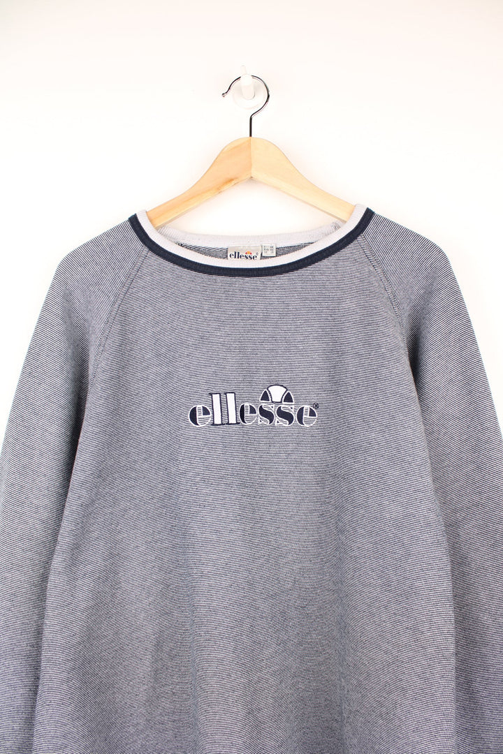 Vintage Ellesse striped sweatshirt in white and navy with embroidered logo across the chest.