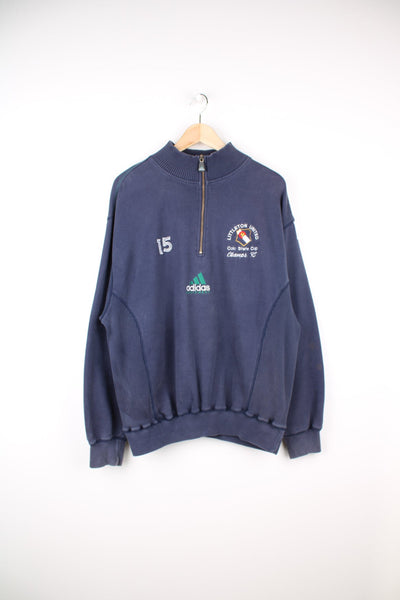 Vintage Adidas Equipment Littleton United Colo State Cup pullover sweatshirt. Features quarter zip, embroidered logo and badge on the sleeve.