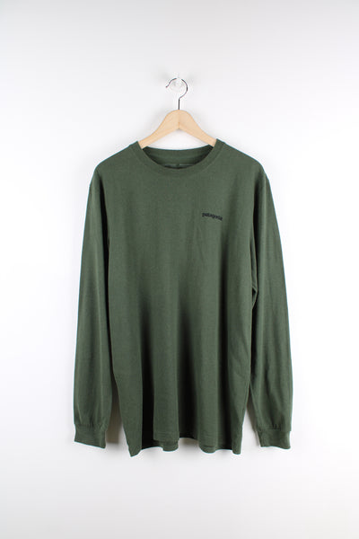 Patagonia long sleeve dark green t-shirt with printed spell-out logo on the front and back 
