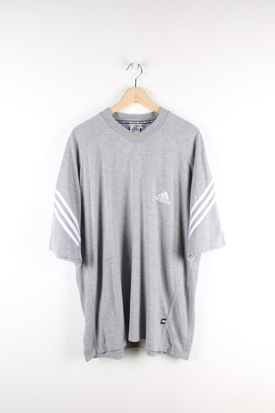 90's Adidas grey t-shirt, features embroidered logo on chest and signature three stripes on the sleeve