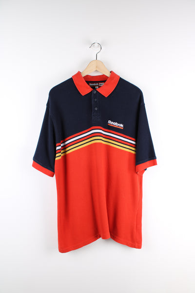 Reebok Athletic Department red and blue polo shirt with embroidered logo on the chest 