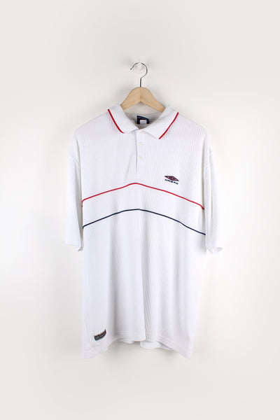 Vintage Umbro ribbed polo shirt features embroidered logo on the chest