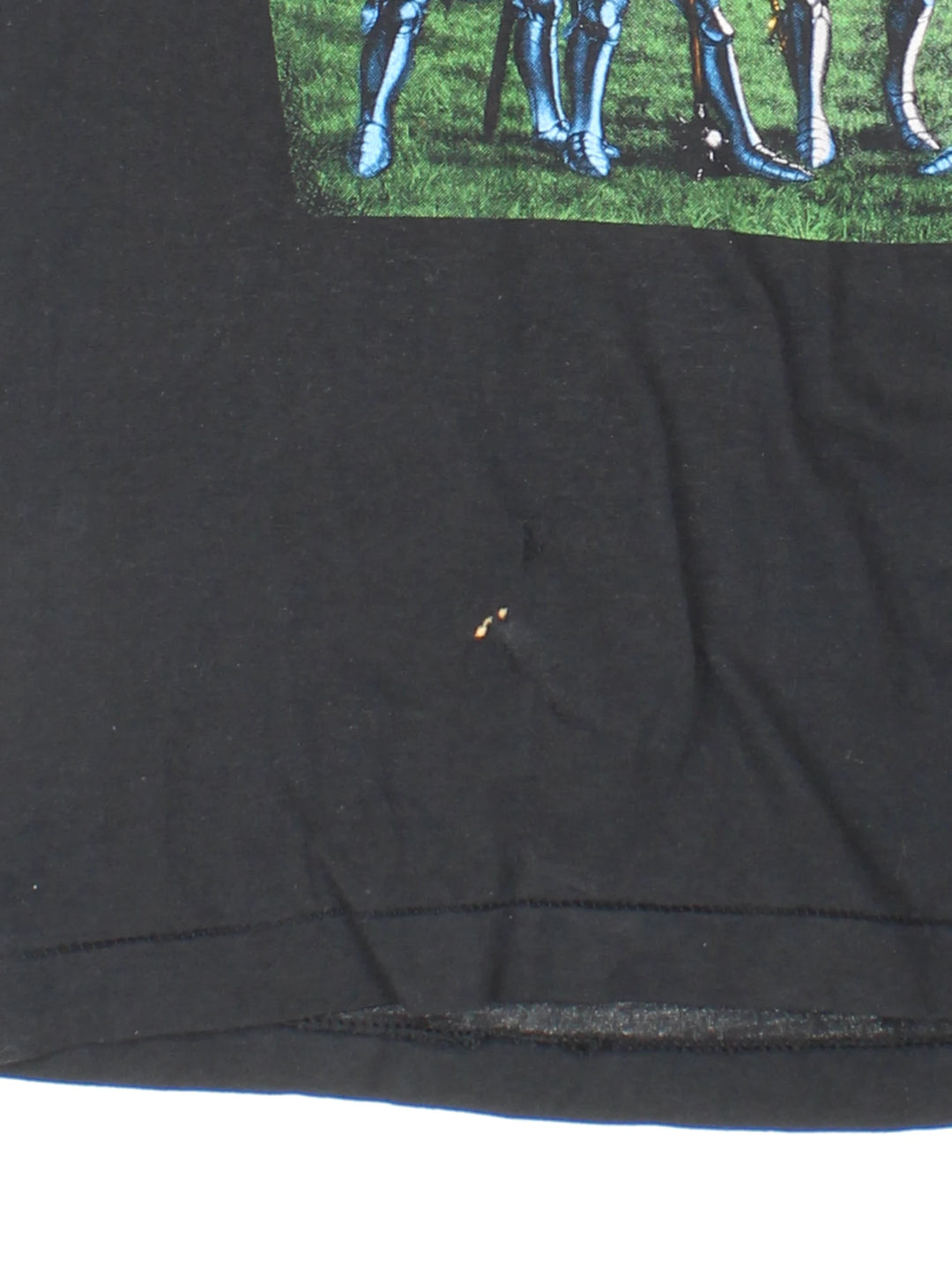 Vintage 80's Armored Saint March Of The Saint single stitch T-Shirt in a black colourway with a medieval knights graphic printed on the front, and the bands pictured and spell out printed on the back.