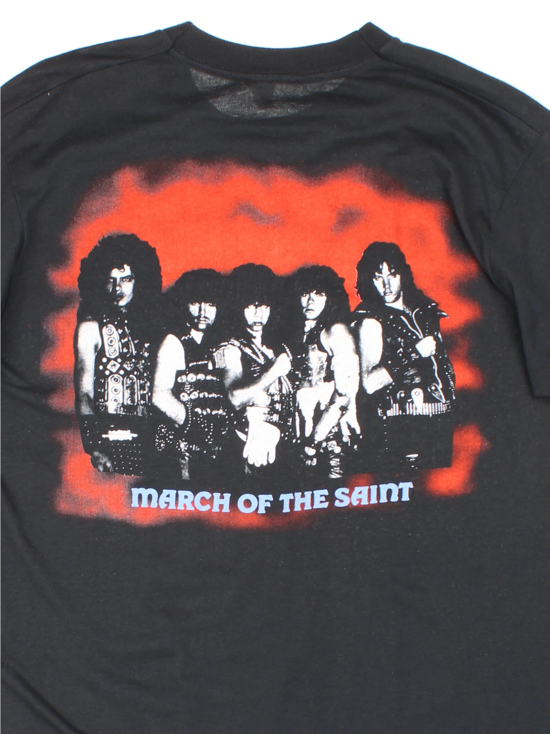 Vintage 80's Armored Saint March Of The Saint single stitch T-Shirt in a black colourway with a medieval knights graphic printed on the front, and the bands pictured and spell out printed on the back.