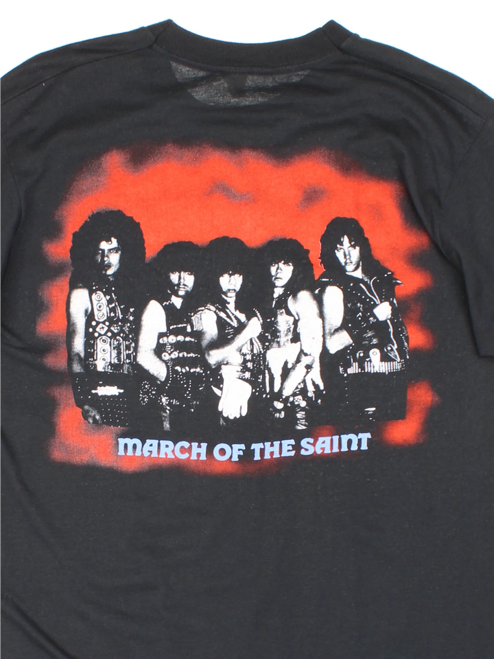 Vintage 80's Armored Saint March Of The Saint single stitch T-Shirt in a black colourway with a medieval knights graphic printed on the front, and the bands pictured and spell out printed on the back.