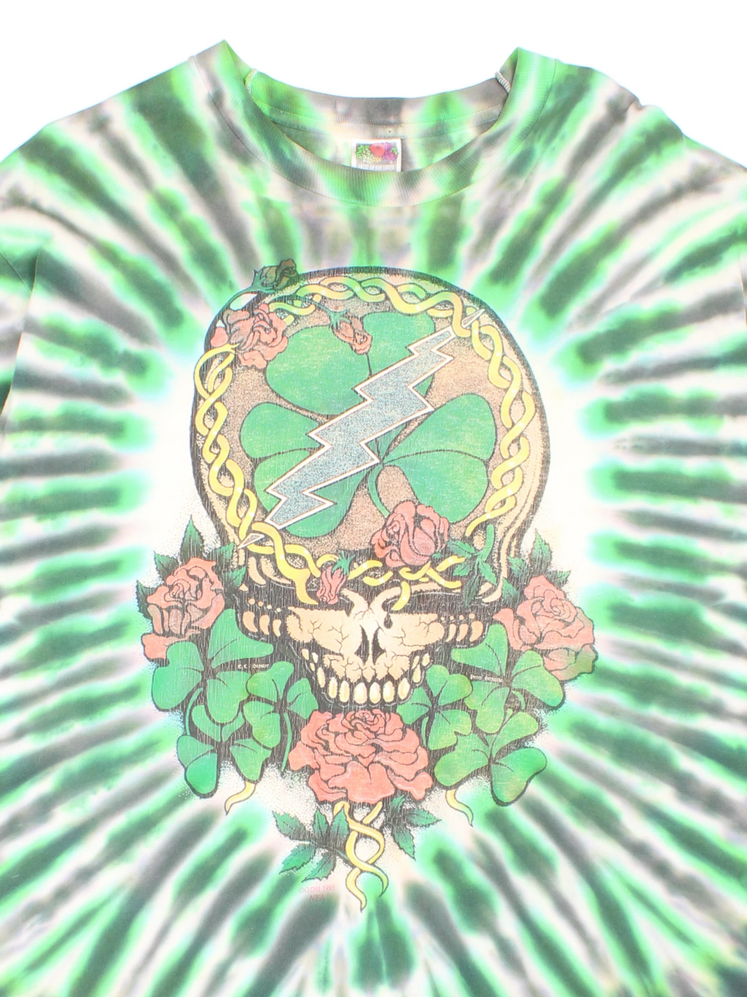 Vintage 1996 Grateful Dead Celtic Shamrock T-Shirt in a green and white tie dye colourway, skull & shamrock printed on the front and the band's name and cross printed on the back.