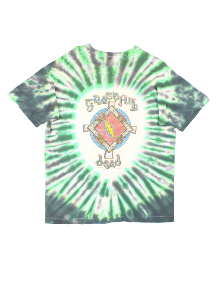 Vintage 1996 Grateful Dead Celtic Shamrock T-Shirt in a green and white tie dye colourway, skull & shamrock printed on the front and the band's name and cross printed on the back.