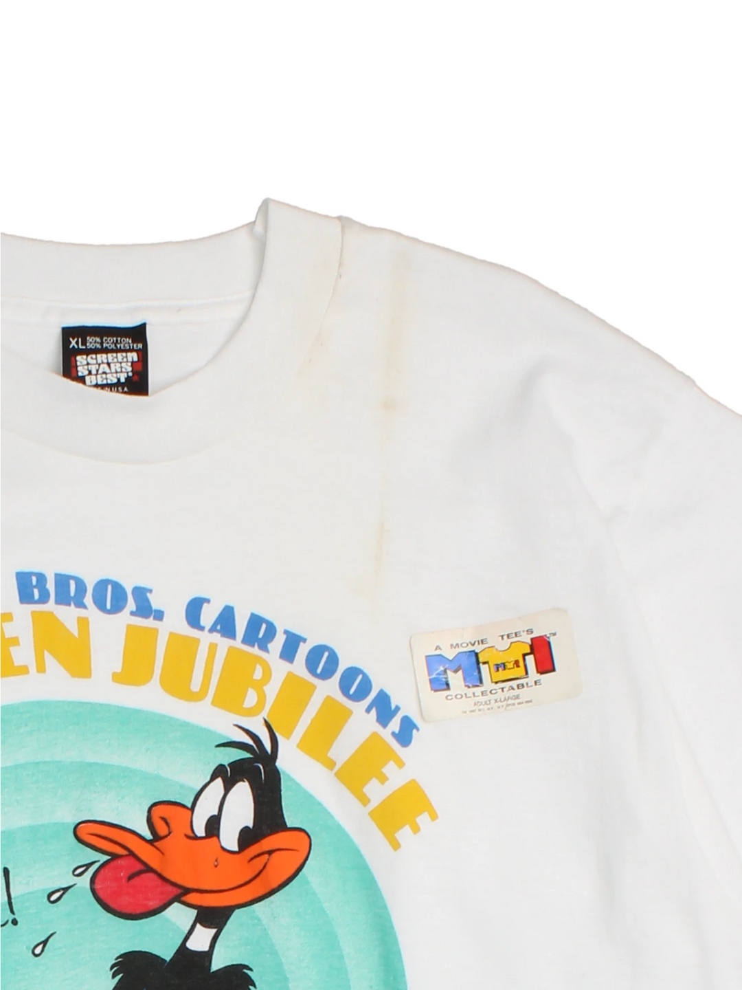 Vintage 1985 Warner Bros Cartoon T-Shirt in a white colourway with big puff print graphic design on the front, deadstock and still has original sticker on the garment.
