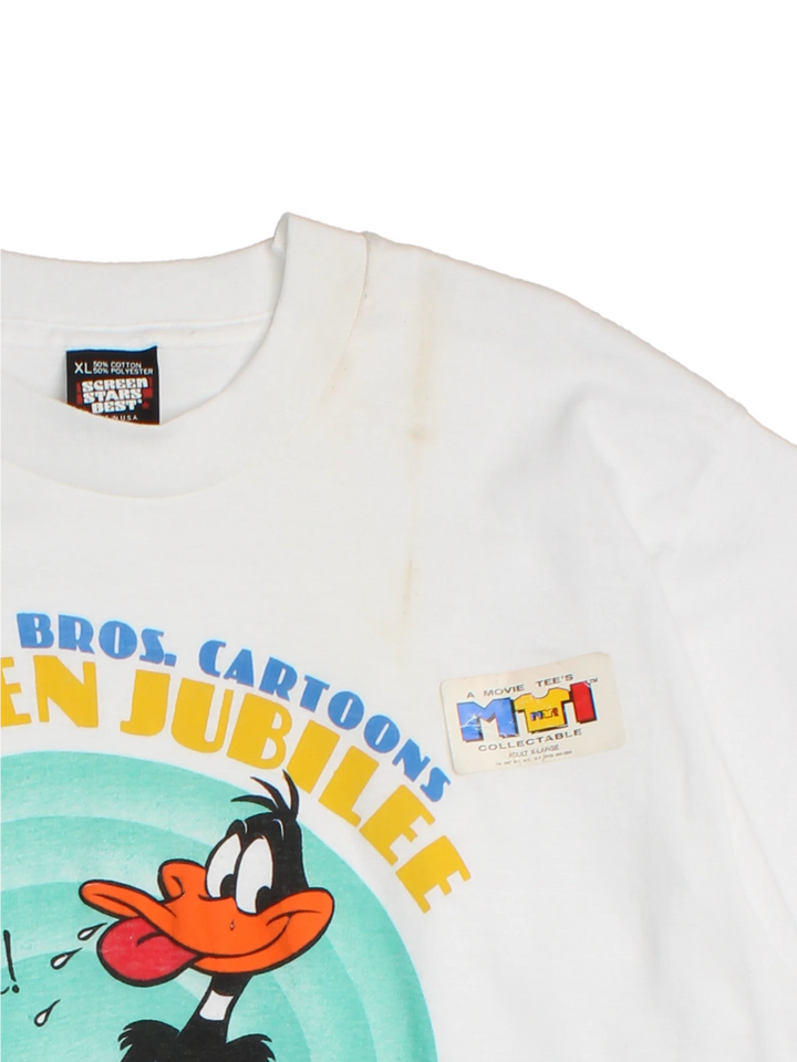 Vintage 1985 Warner Bros Cartoon T-Shirt in a white colourway with big puff print graphic design on the front, deadstock and still has original sticker on the garment.