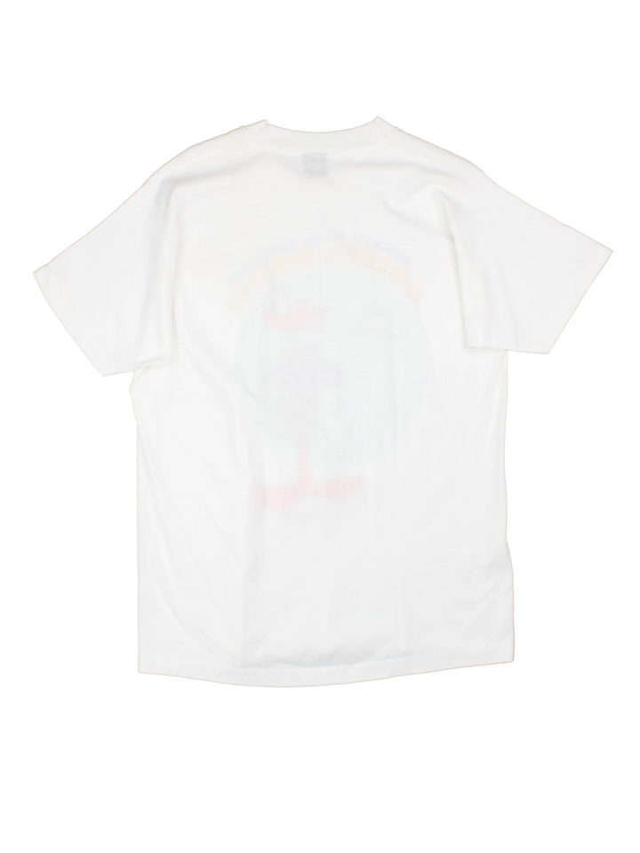 Vintage 1985 Warner Bros Cartoon T-Shirt in a white colourway with big puff print graphic design on the front, deadstock and still has original sticker on the garment.