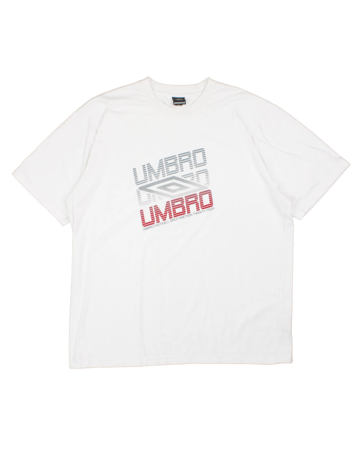 Umbro T-Shirt in a white colourway, short sleeve crewneck, and has logo spell out printed on the front.