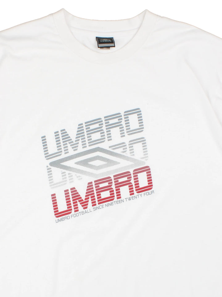 Umbro T-Shirt in a white colourway, short sleeve crewneck, and has logo spell out printed on the front.