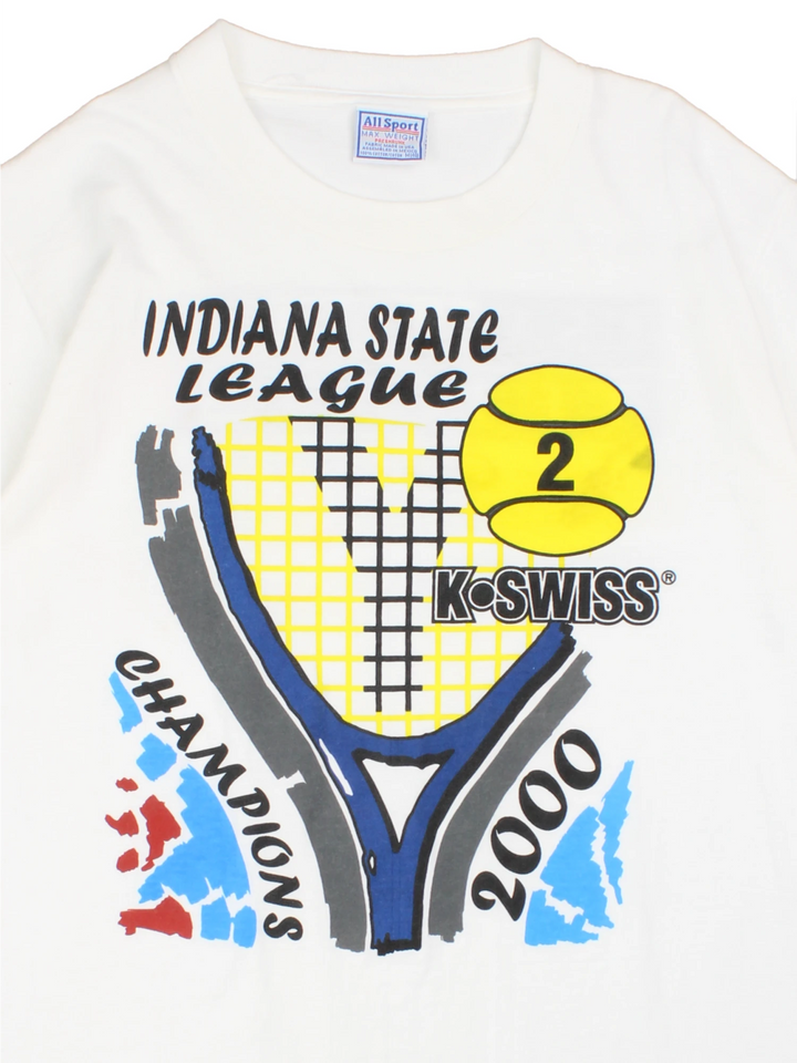 2000 'Indiana State League Champions' white spellout graphic tee with tennis racket and ball design and K. SWISS sponsor logo. Back graphic reading 'USA league tennis presented by Infiniti'.  