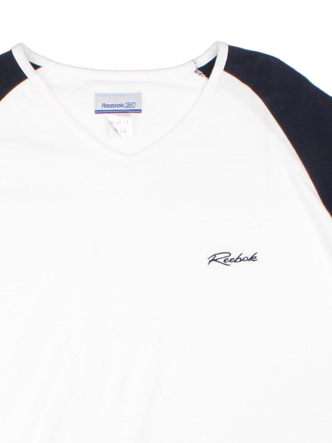 2000's Reebok white and blue v-neck baby tee, features white piping and embroidered spell-out logo on the chest
