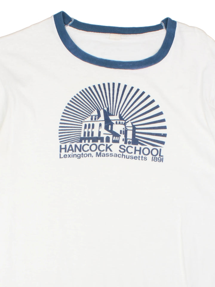 Vintage Hancock School Massachusetts Ringer T-Shirt in a white and blue colourway with the school graphic and spell out printed on the front. 