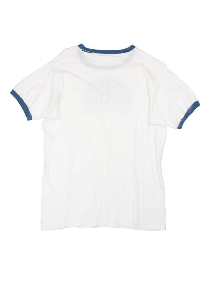 Vintage Hancock School Massachusetts Ringer T-Shirt in a white and blue colourway with the school graphic and spell out printed on the front. 