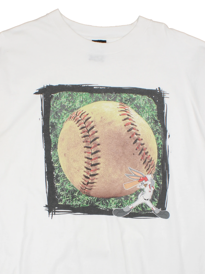 Vintage Warner Bros Bugs Bunny Baseball T-Shirt in a white colourway with Bugs Bunny hitting a big baseball printed on the front. 