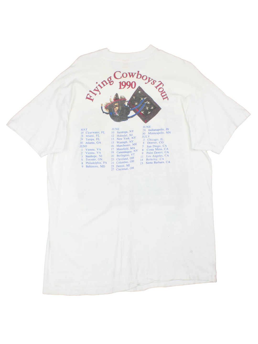 Vintage 1990 Rickie Lee Jones Flying Cowboys Tour T-Shirt in a white colourway, single stitch, and has large art graphic and spell out printed on the front, and on the back has the tour dates and spell out.