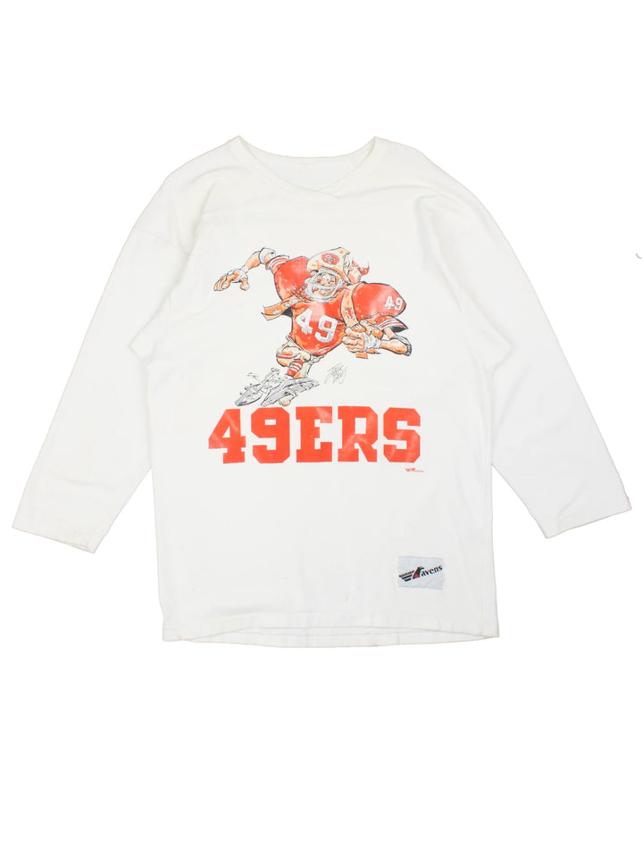 Vintage San Francisco 49ers NFL Jack Davis Graphic Jersey T-Shirt in a white colourway with the spell out logo and Jack Davis football illustration graphic printed on the front.