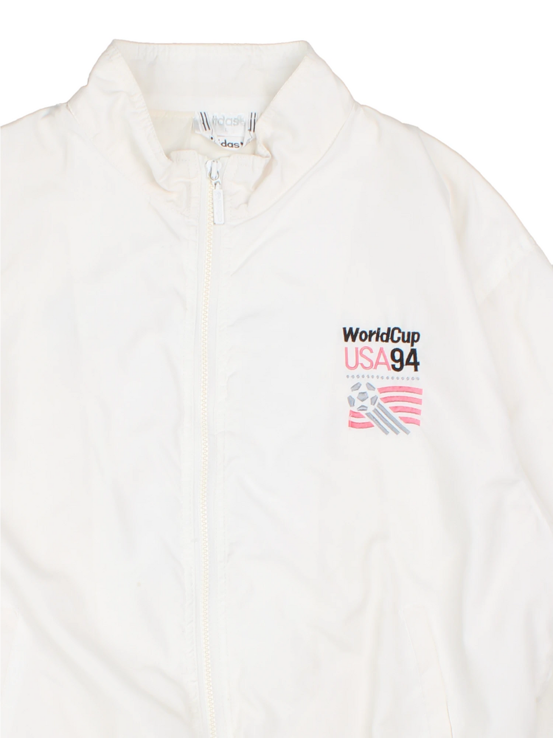 World Cup USA 94 Tracksuit Top by adidas in white with embroidered spell-out and graphic on front back and sleeve