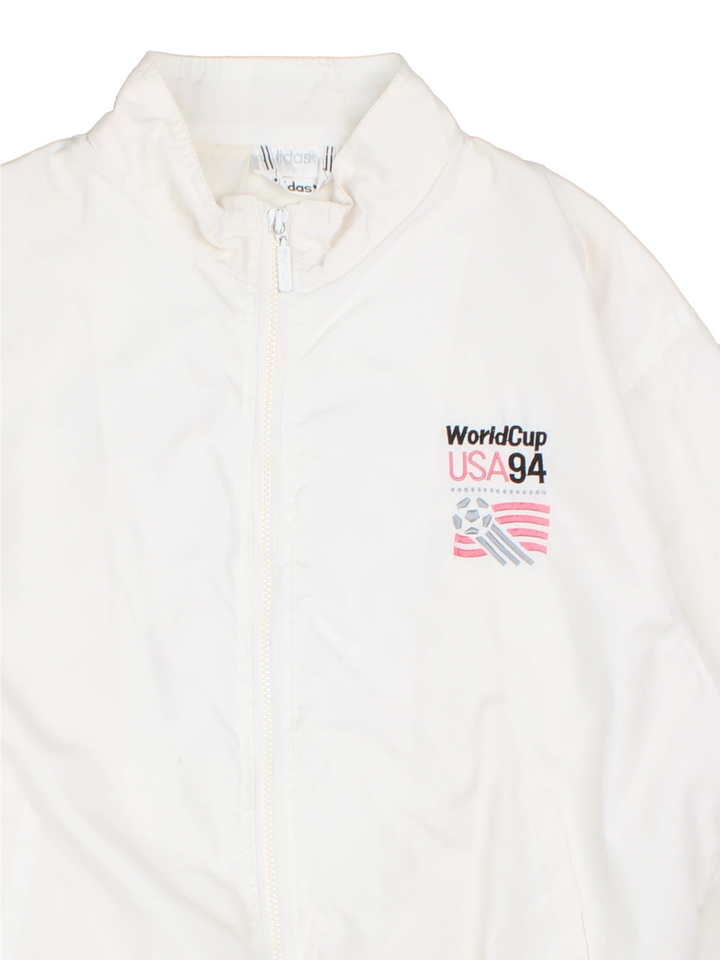 World Cup USA 94 Tracksuit Top by adidas in white with embroidered spell-out and graphic on front back and sleeve