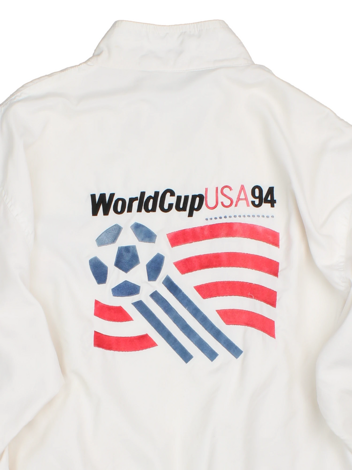 World Cup USA 94 Tracksuit Top by adidas in white with embroidered spell-out and graphic on front back and sleeve