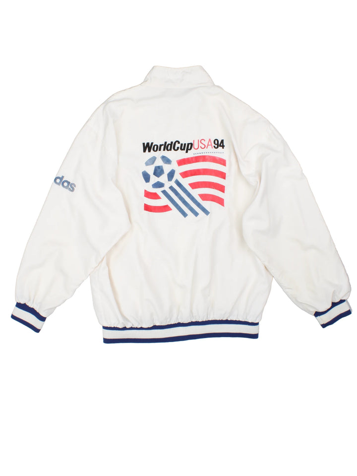 World Cup USA 94 Tracksuit Top by adidas in white with embroidered spell-out and graphic on front back and sleeve