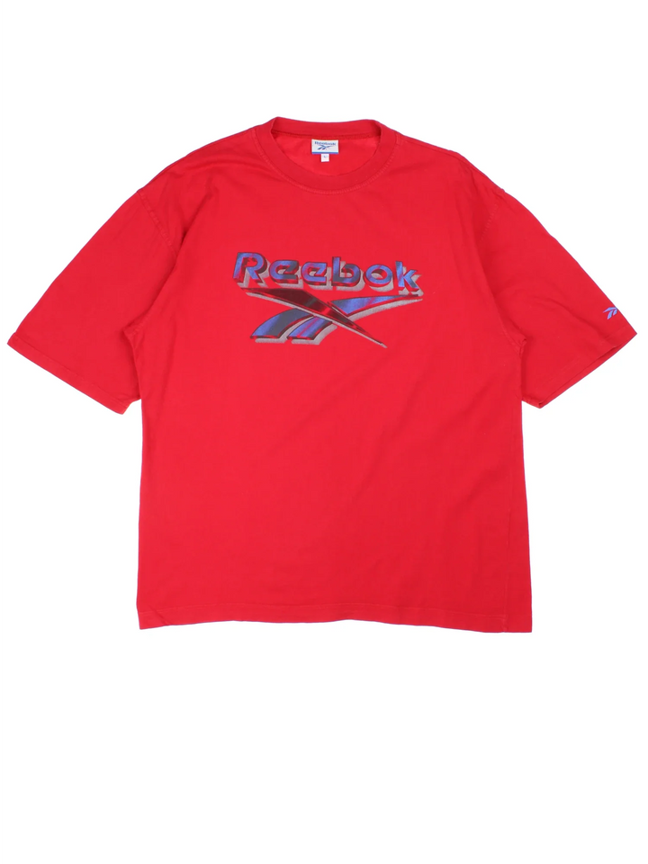 Vintage Reebok T-Shirt in a red colourway with the logo printed across the front.